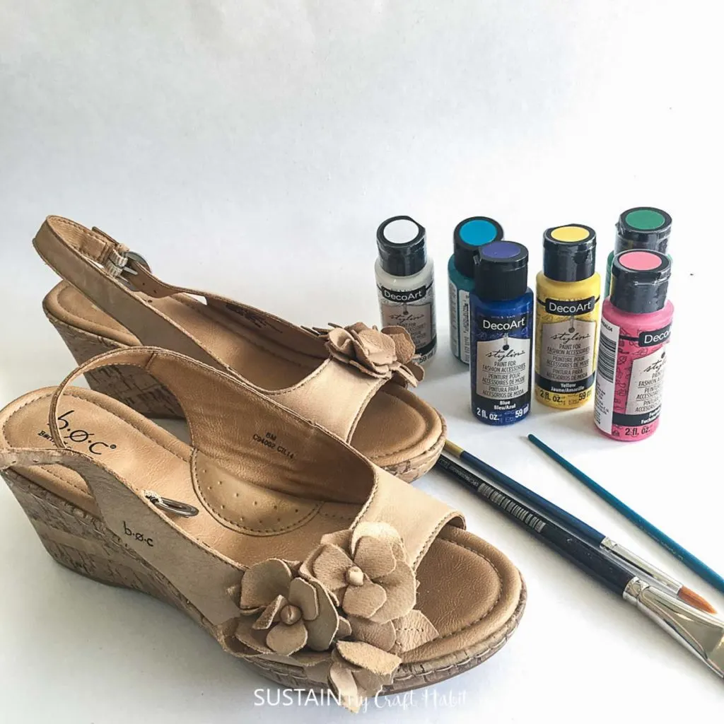 Sandals, paintbrushes and paint.