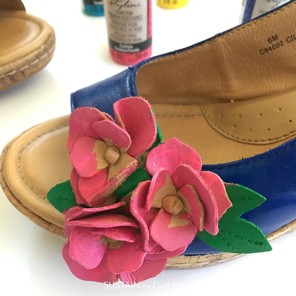 Painting the flower embellishement on the sandal pink.