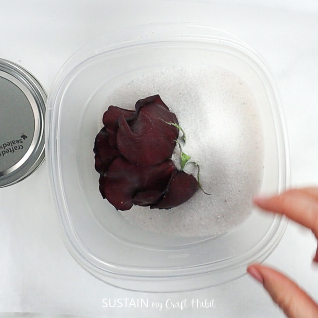 gently remove dried rose from crystals