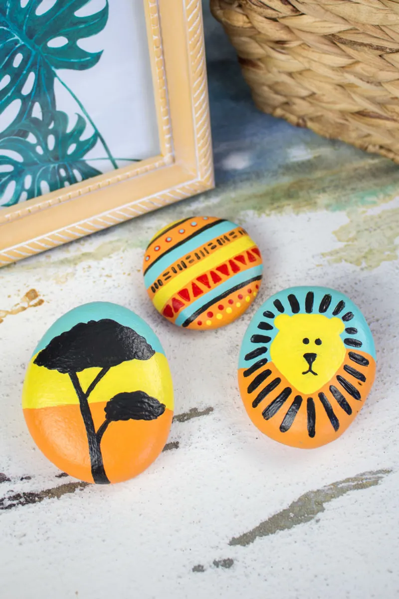 Lion king inspired painted rocks.