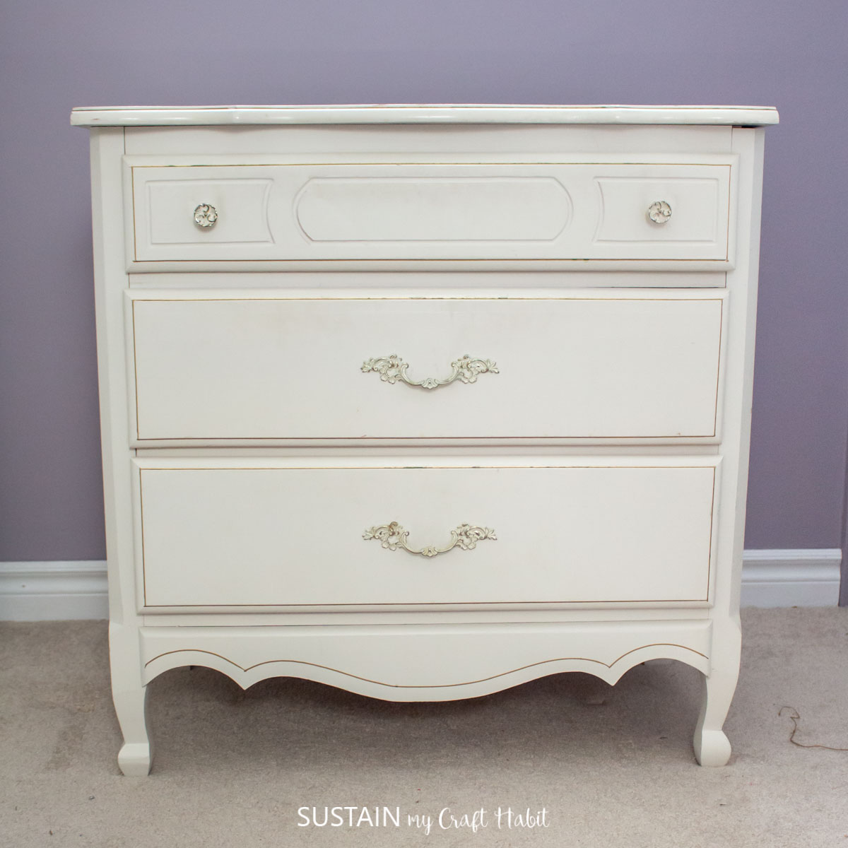 Before image of the cream French country style dresser.
