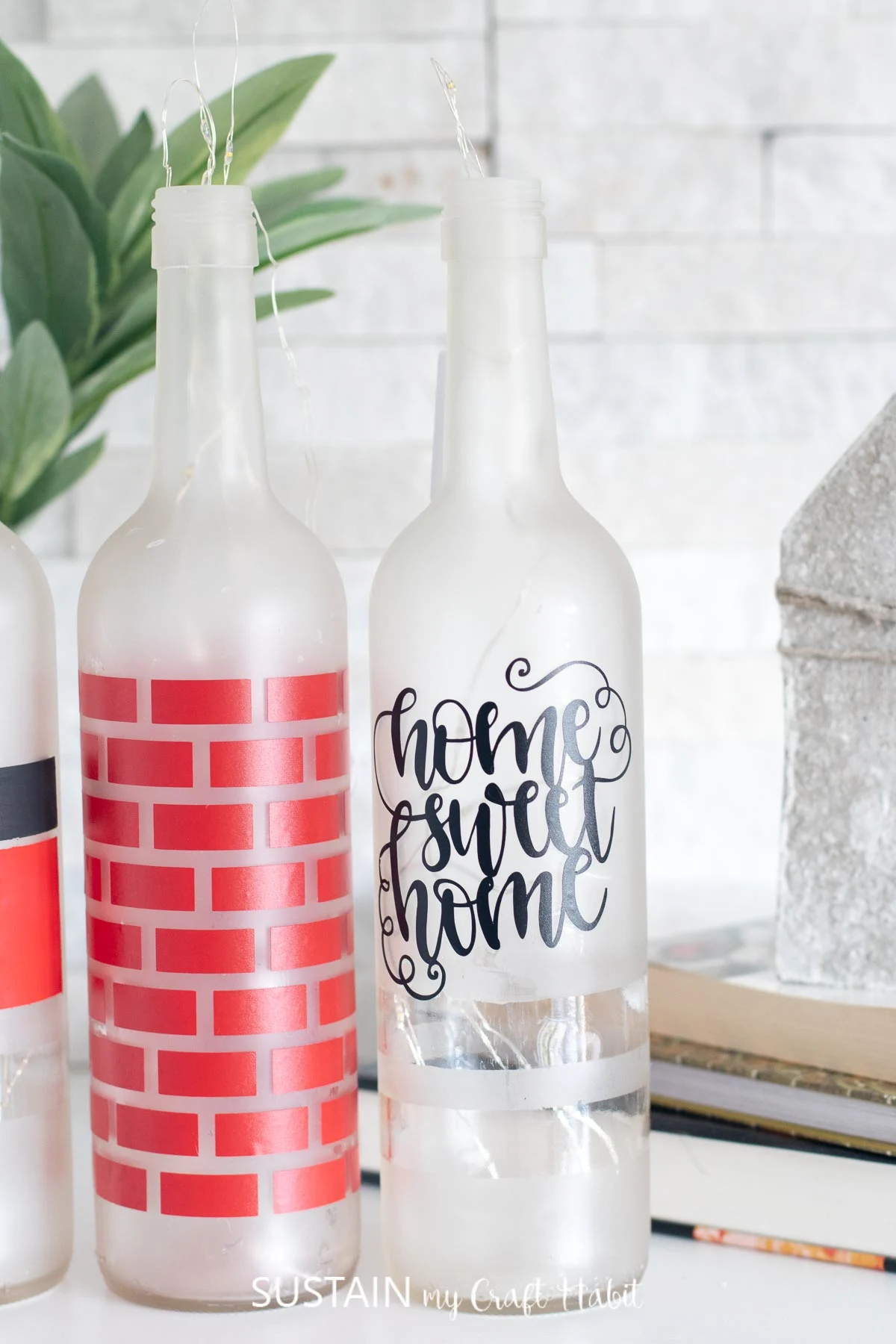 Close up image of bottle with the home sweet home decal in a fancy, scripted font.