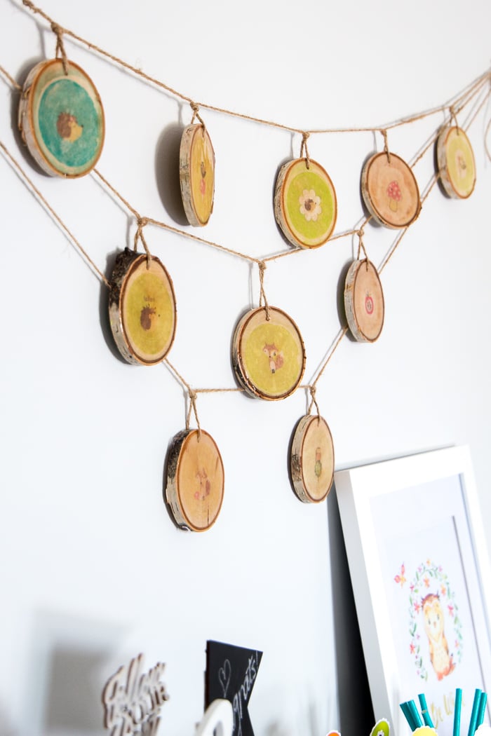 Wood slice garland with woodland pictures.