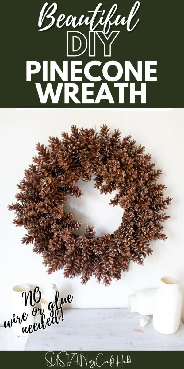 Pinecone wreath hung on the wall with text overlay.