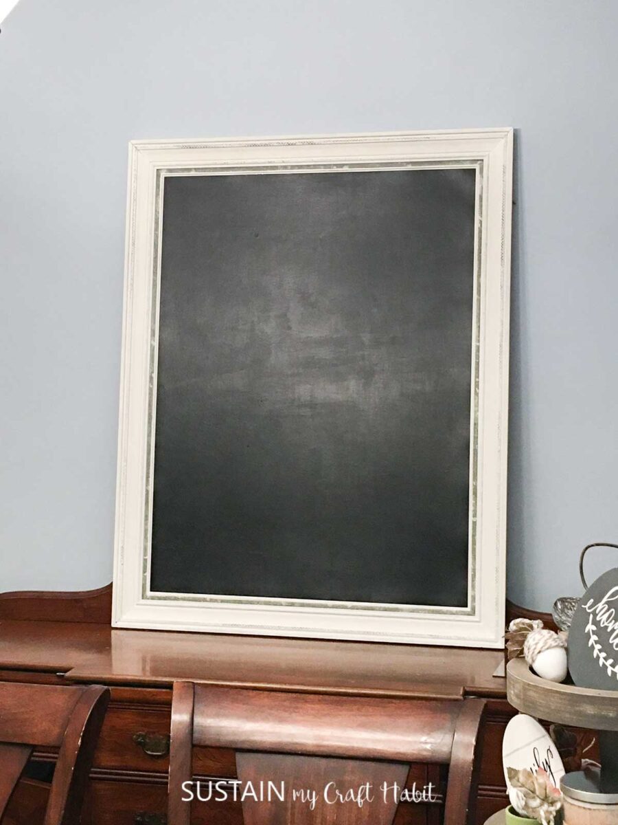 Painted framed chalkboard.
