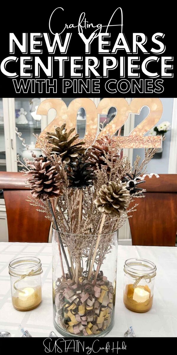 New years centerpiece with pine cones, ribbon, embellishments and a 2022 sign placed on a table with text overlay.