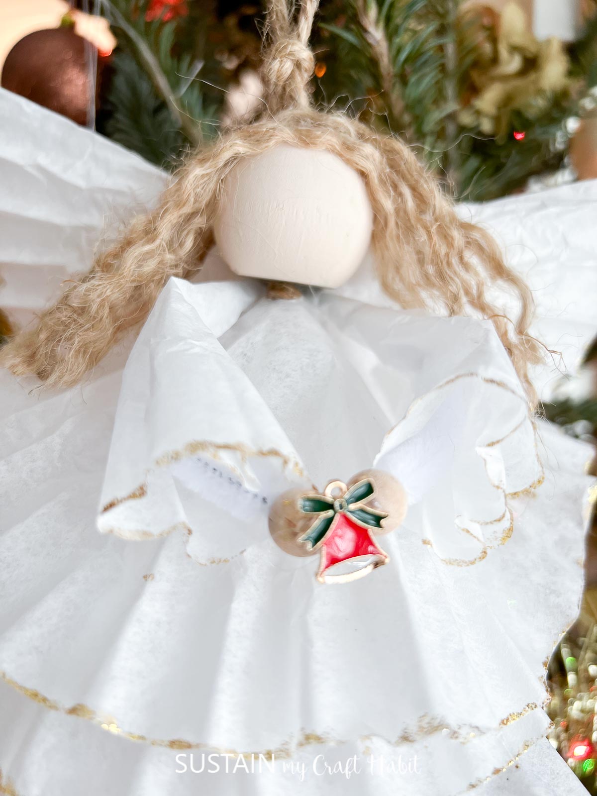 Close up of a coffee filter angel craft.