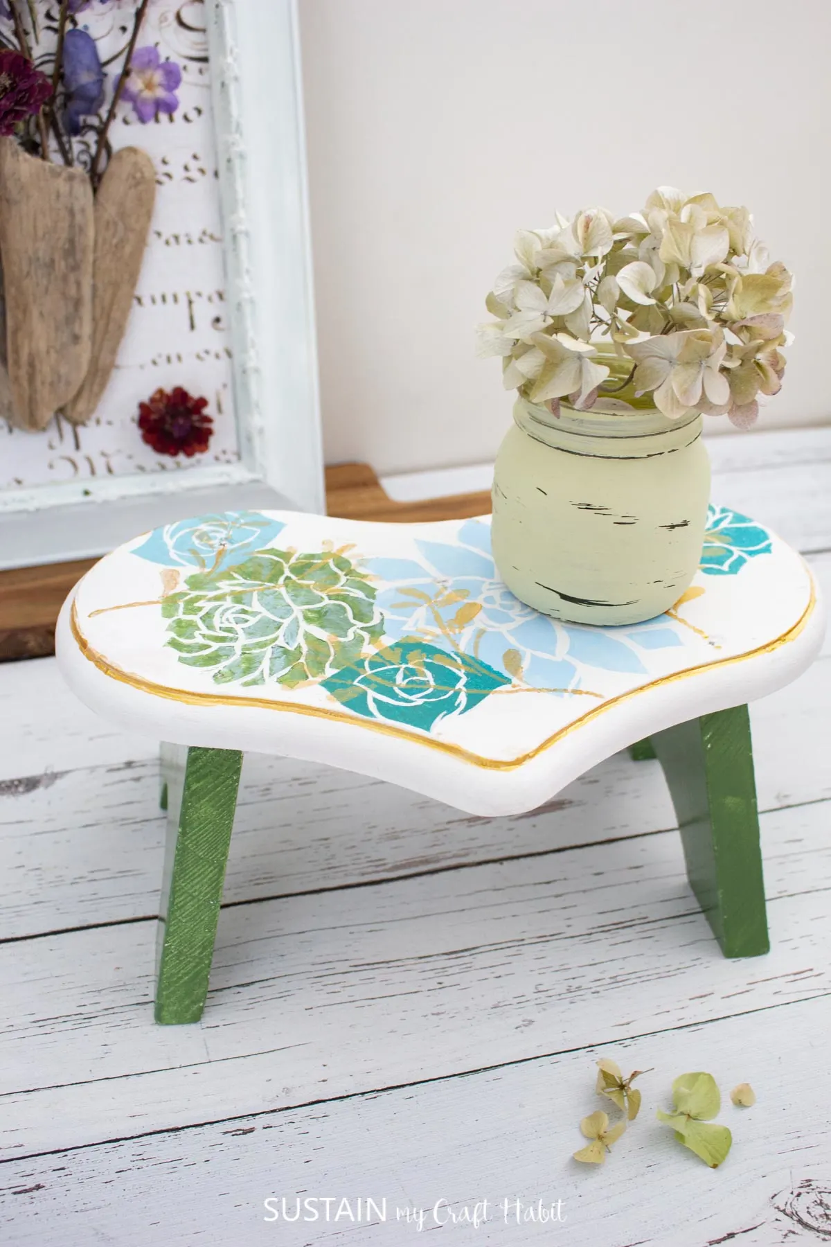 Step stool makeover with paint and a stencil.