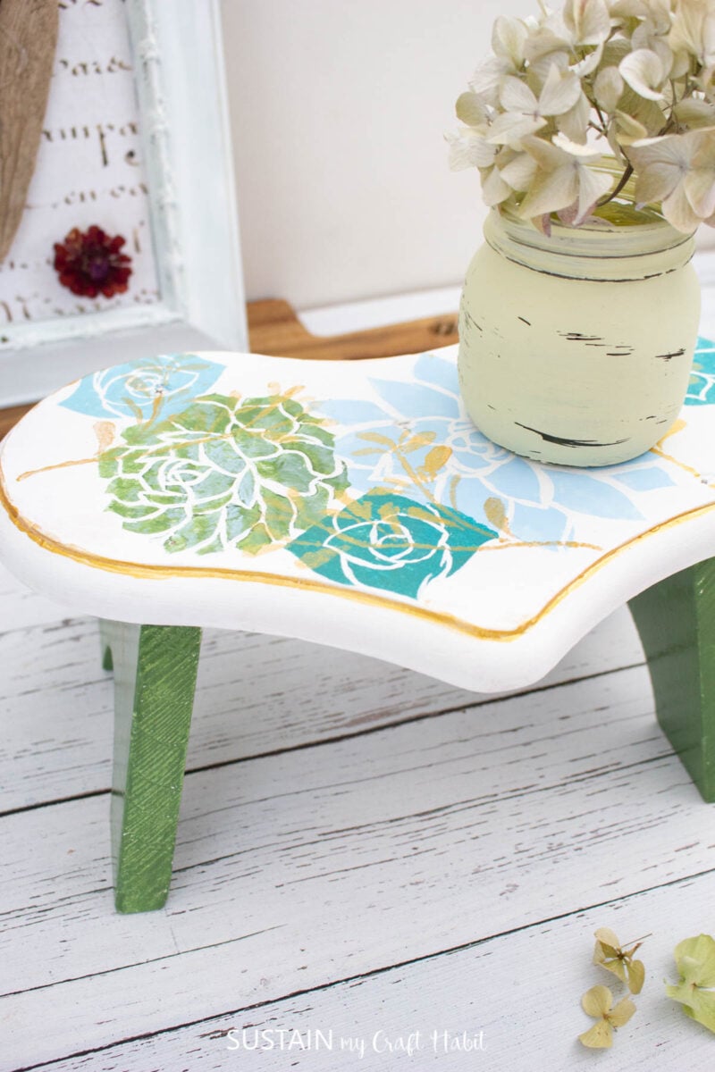 Stepstool makeover with paint and a stencil.