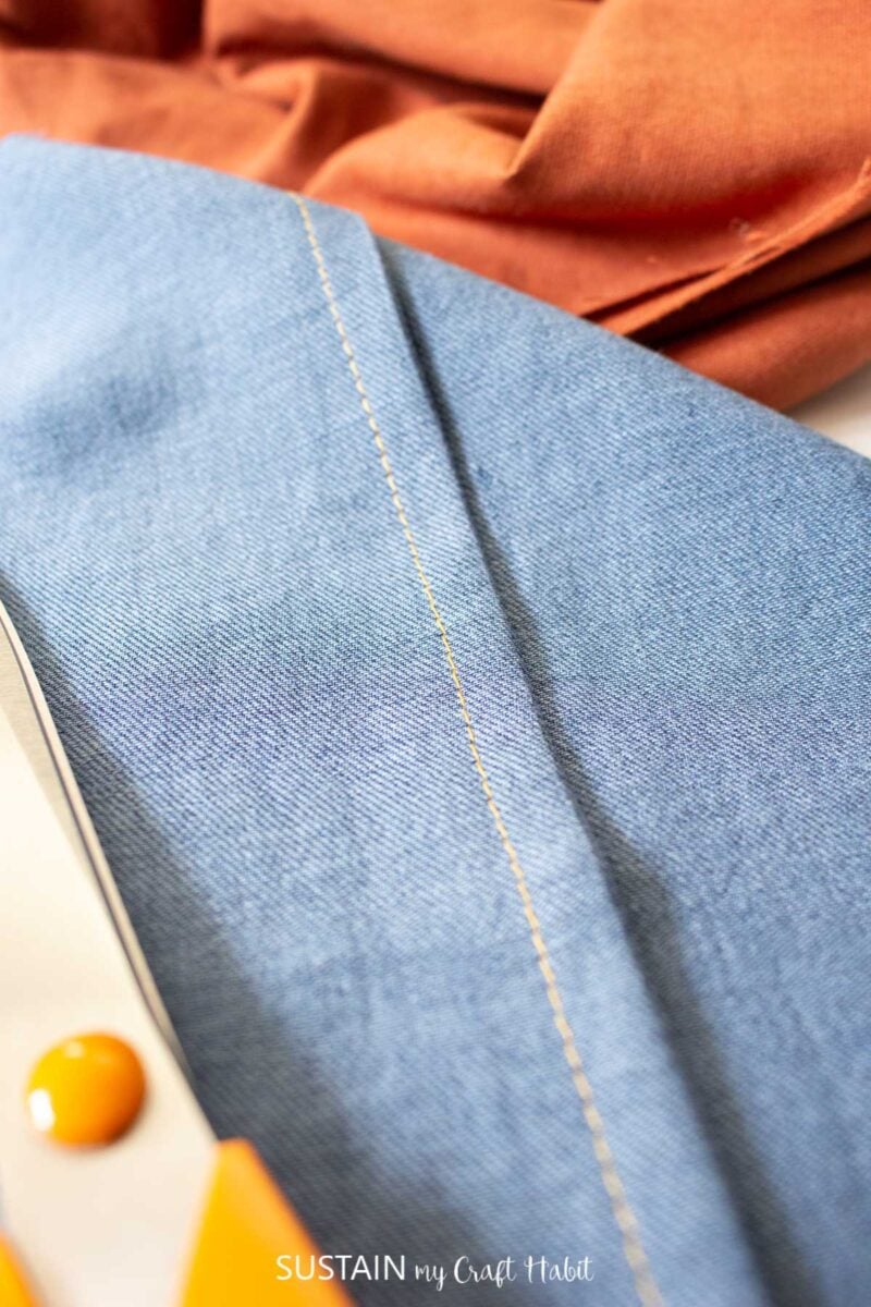 Close up of a french seam stitch on fabric.