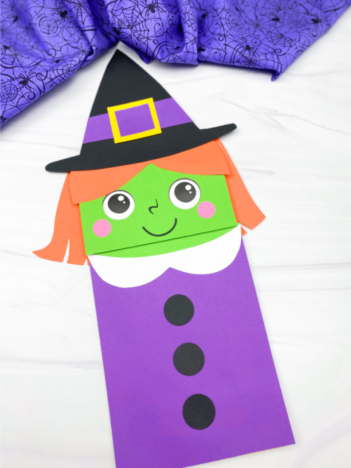 Colorful witch puppet.