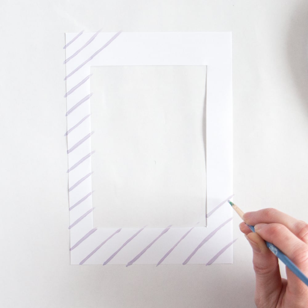Painting lines onto a photo insert.