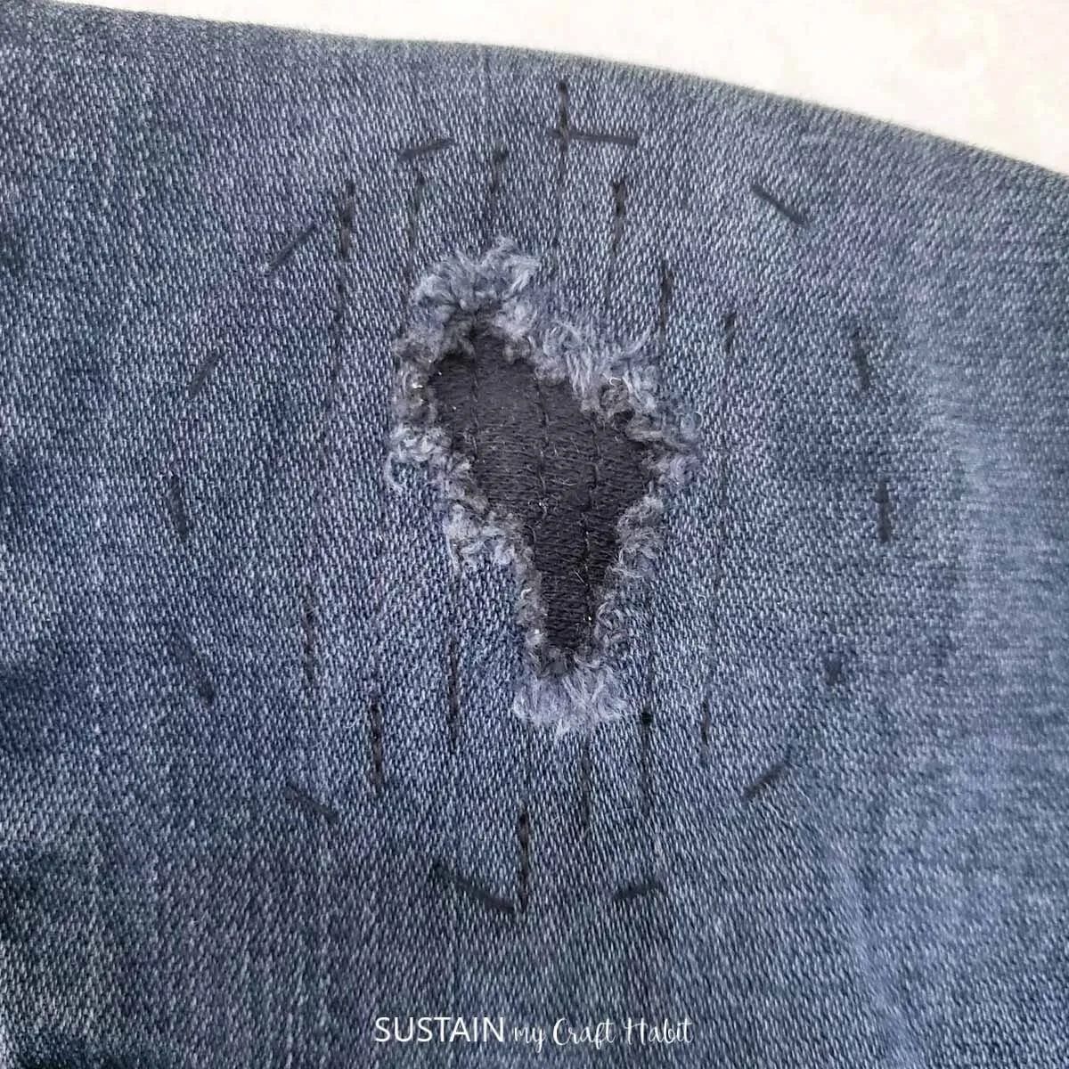 Sewed an iron-on patch over a hole to stop my wallet from falling out. Will  it be ok to wash/dry with the glue exposed inside the pocket since it's  over the hole?
