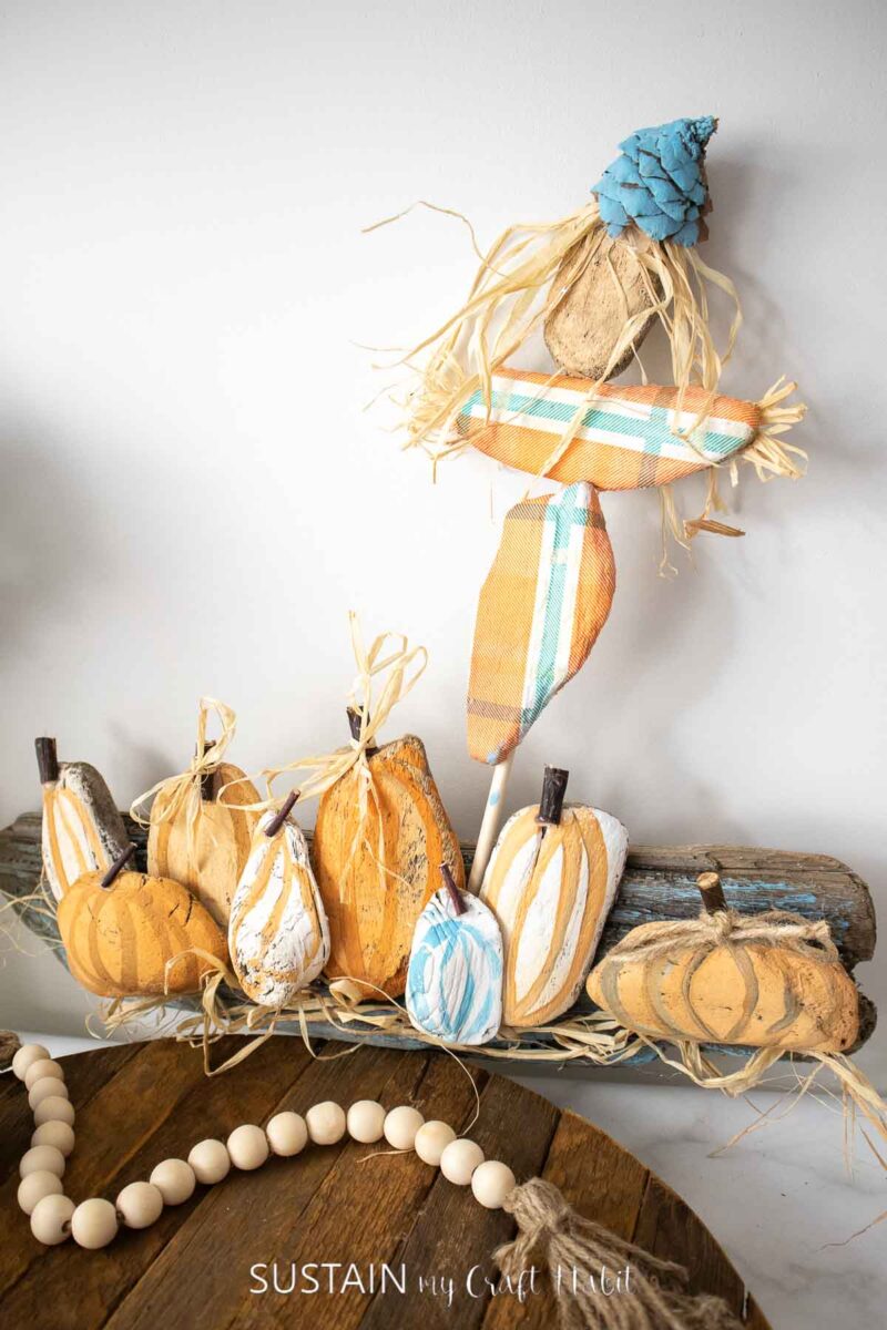 Pumpkin patch made from painted driftwood.