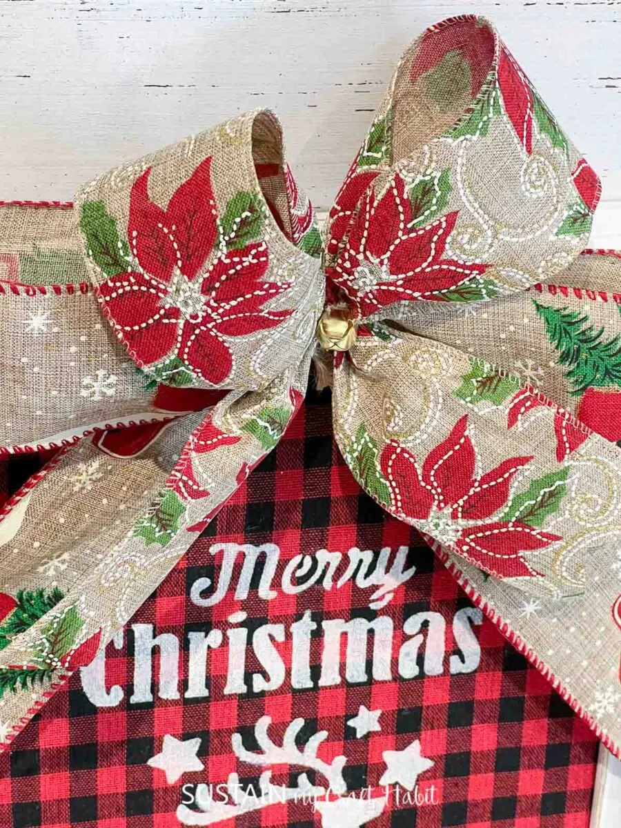Close up of Christmas ribbon made into a bow.