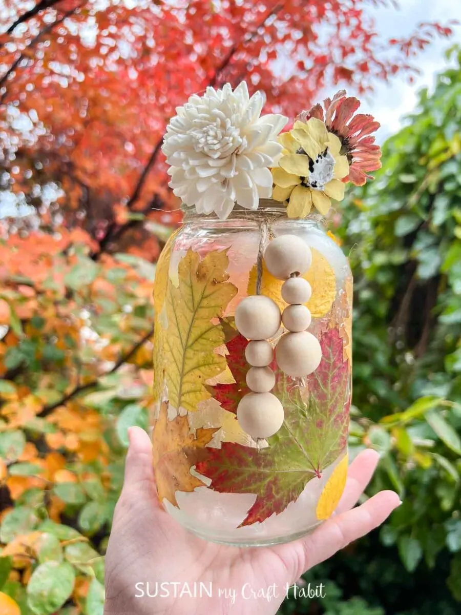 Fall mason jar decor with artificial maple leaves bush