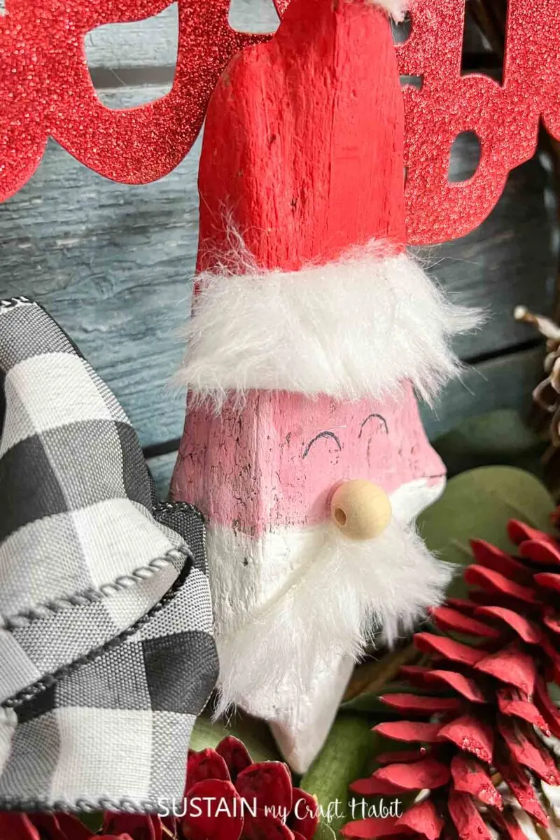 Close up of a driftwood Santa.