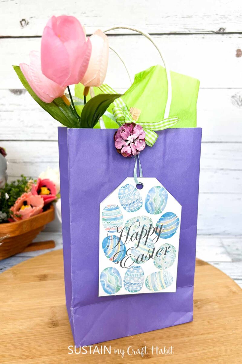 Easter gift tag attached to a gift bag.