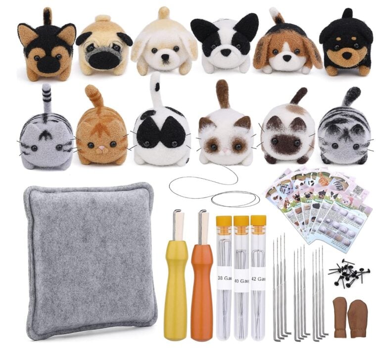 Various materials needed to make 12 needle felted cats and dogs.