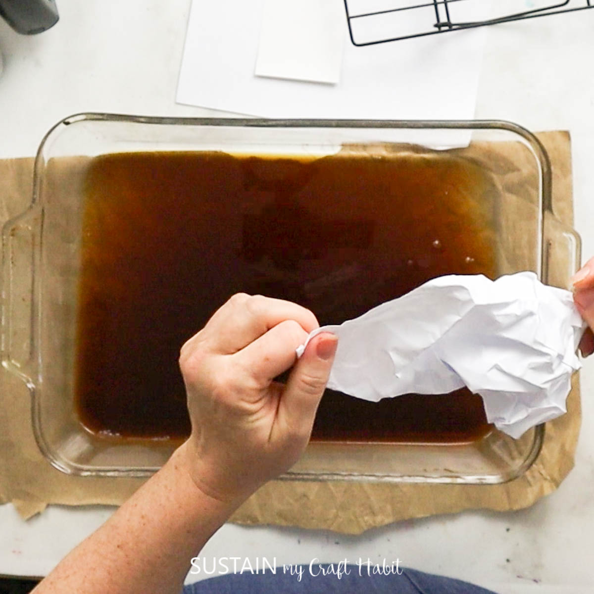 using crumbled up paper to stain with coffee