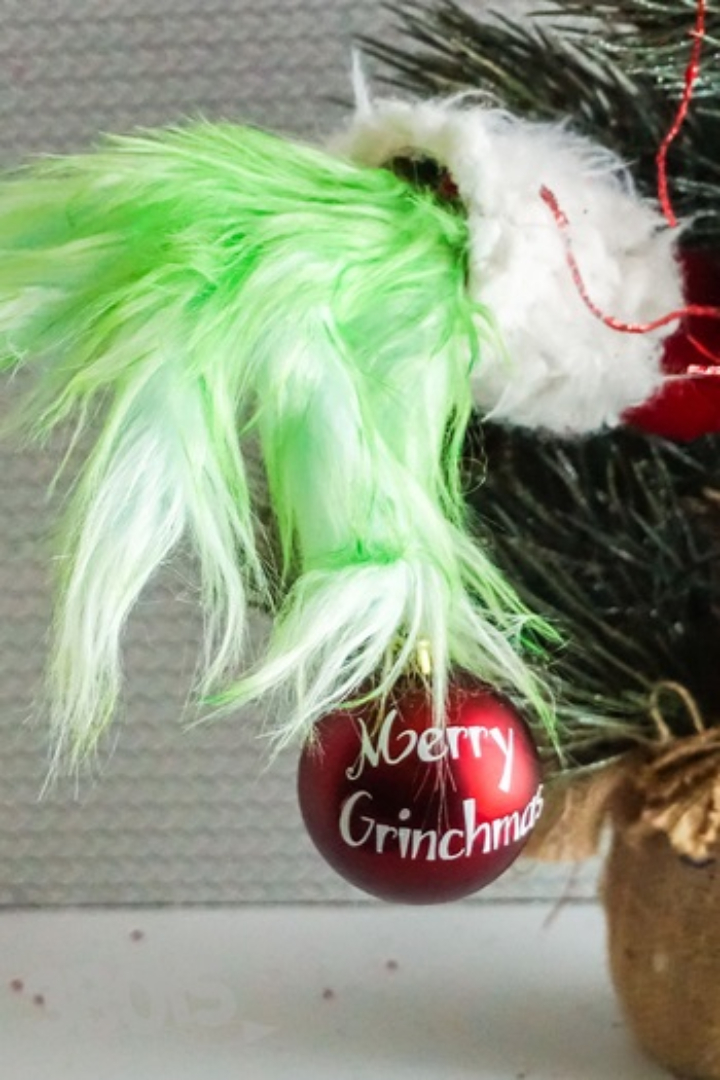 grinch hand ornament