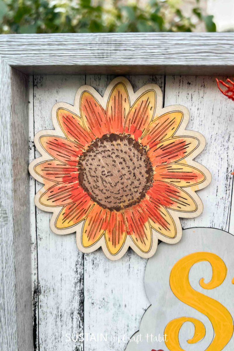 Painted sunflower cut from an xTool machine.