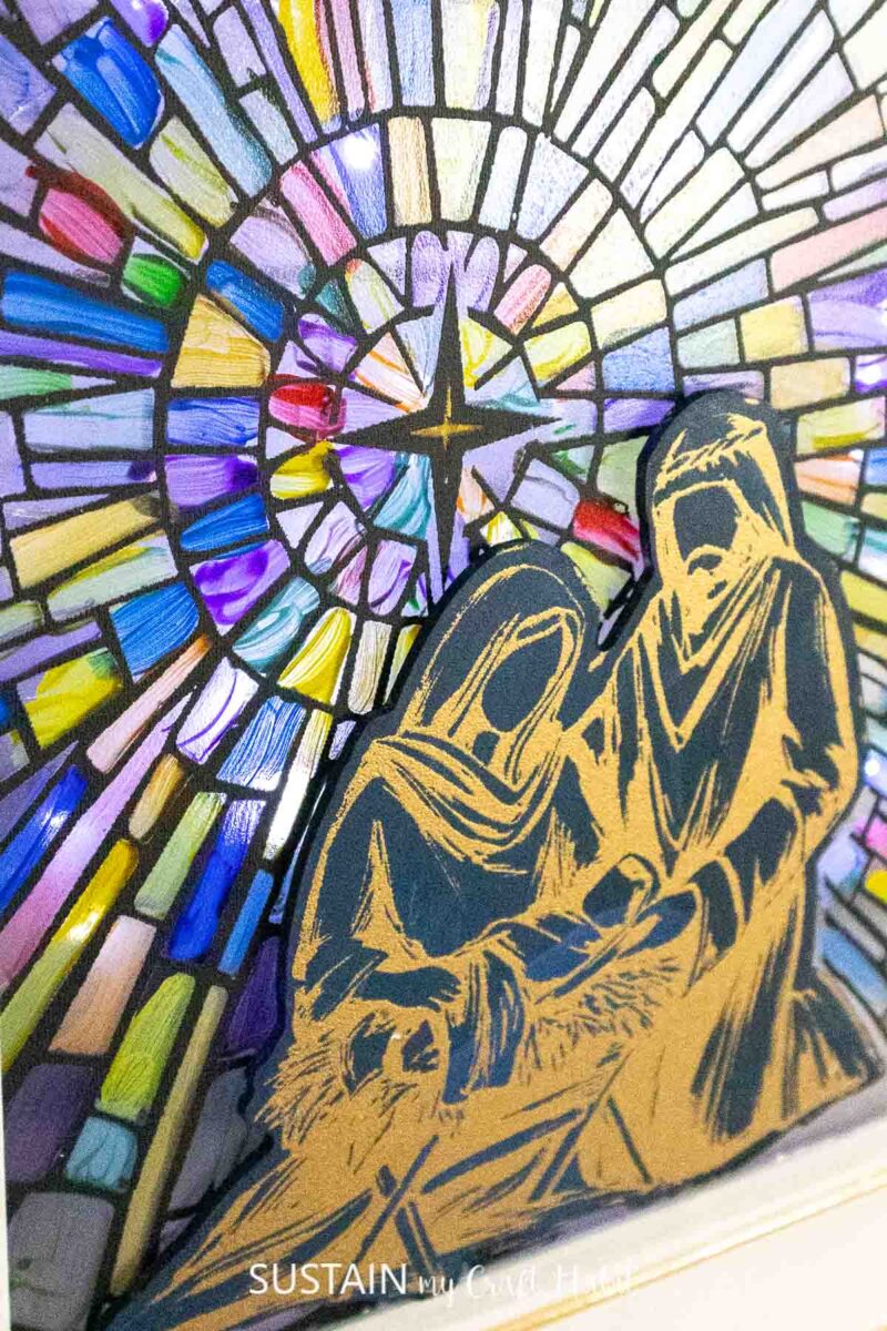 Close up of stained glass Nativity scene.