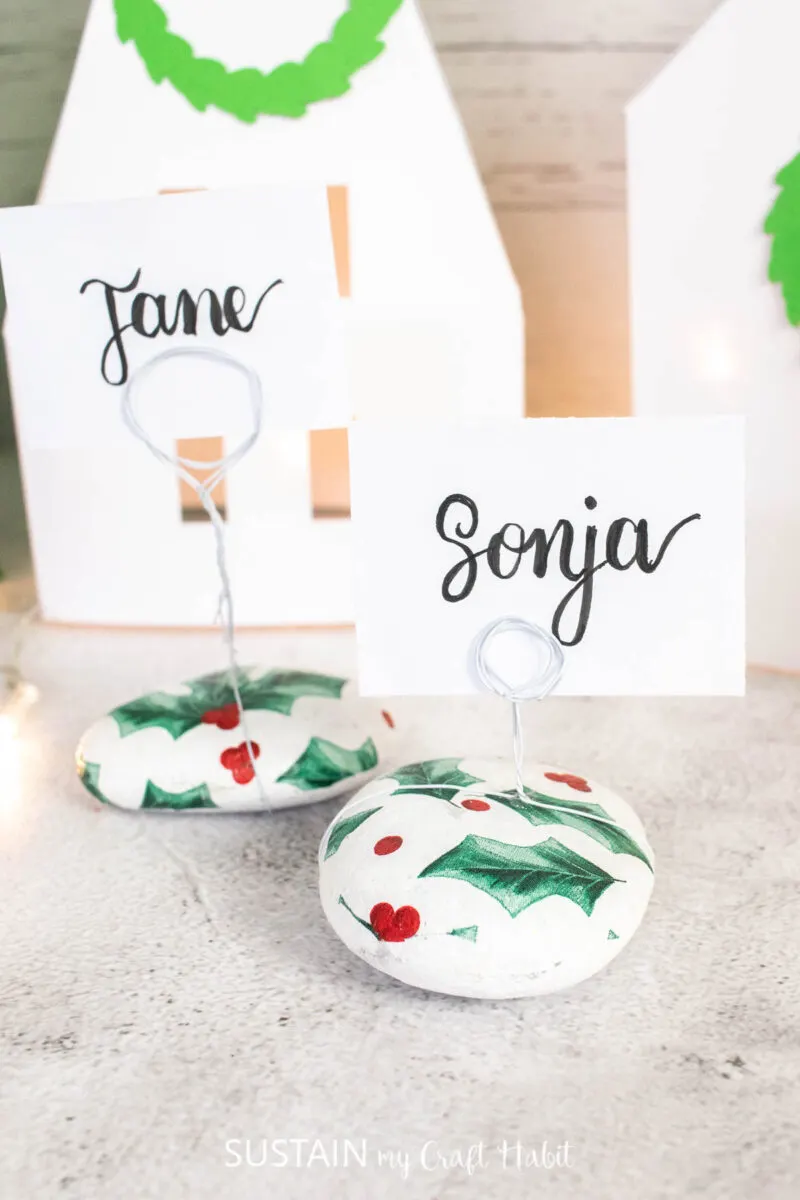 Christmas name place holders made from decoupaged rocks.