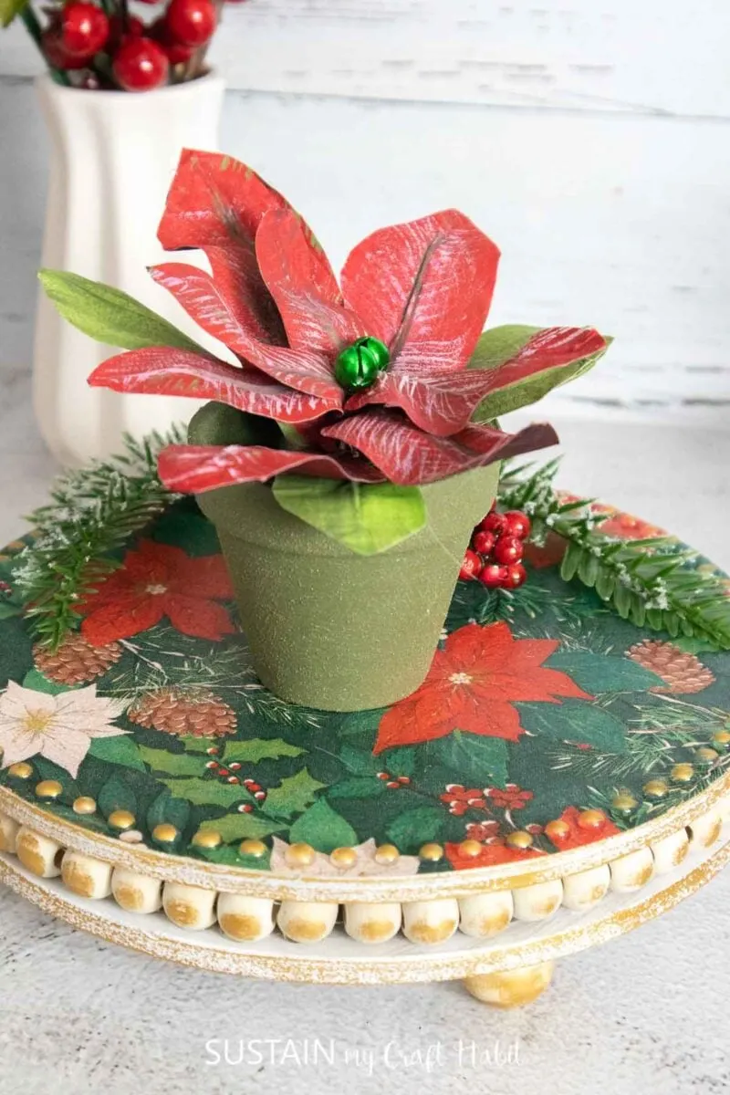 Christmas poinsettia crafted with masking tape, paint and floral wire.