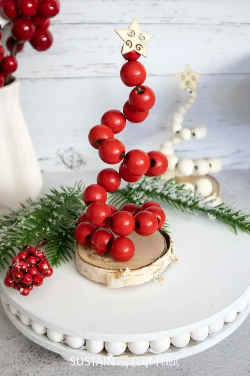Beaded spiral Christmas tree painted red.