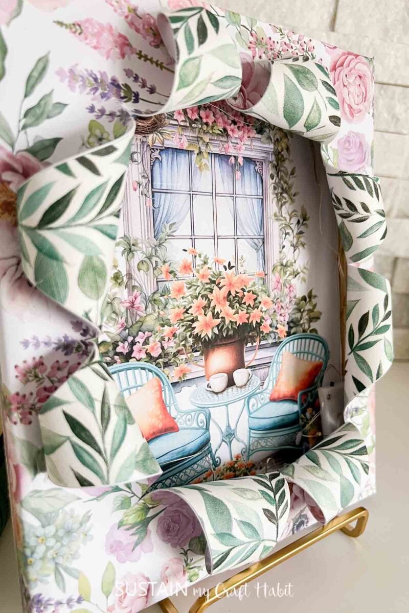 Close up of image in busted canvas.