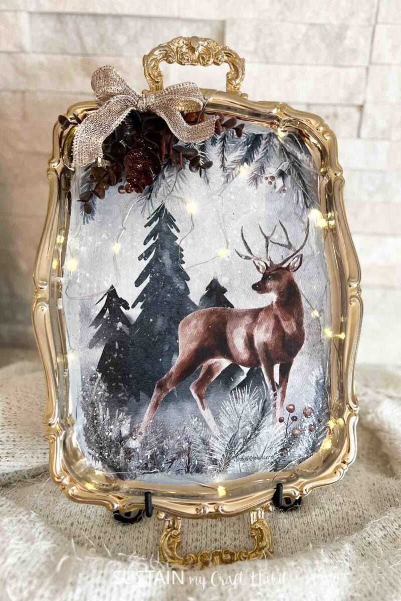 Upcycled silver tray with decoupage, twinkle lights and a embellishments. 