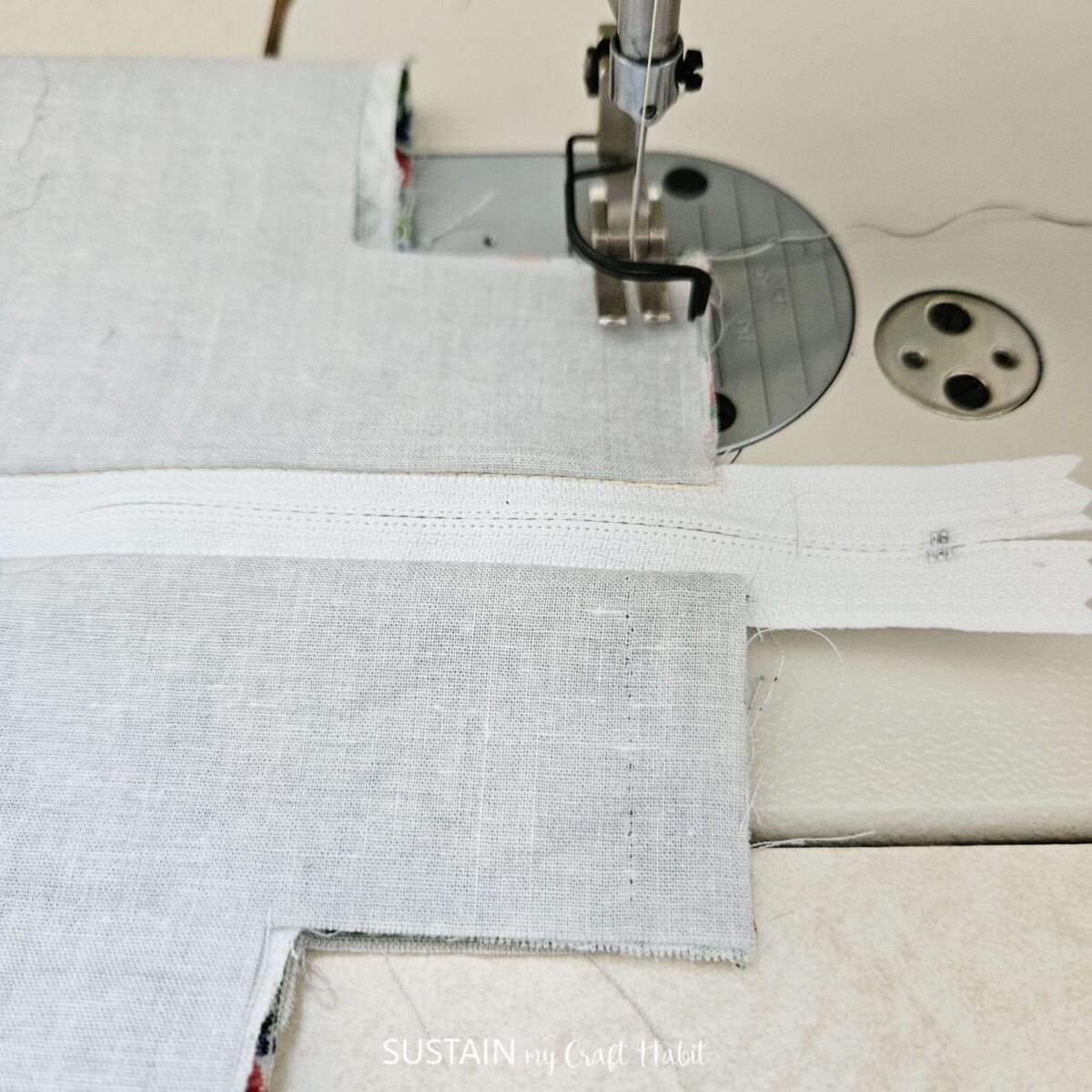 Sewing edges of the makeup bag.
