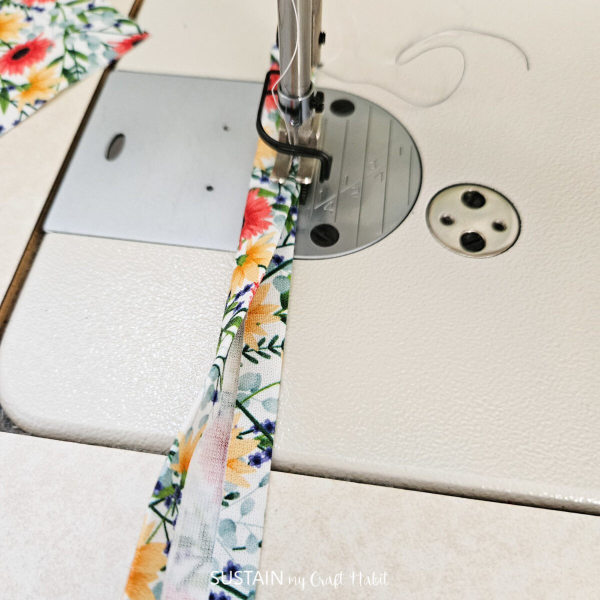 Sewing fabric to create a loop.