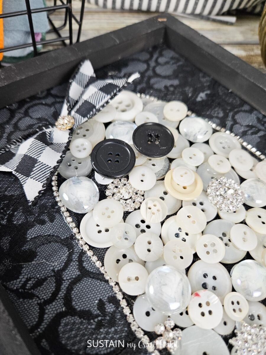 Close up of button ghost.