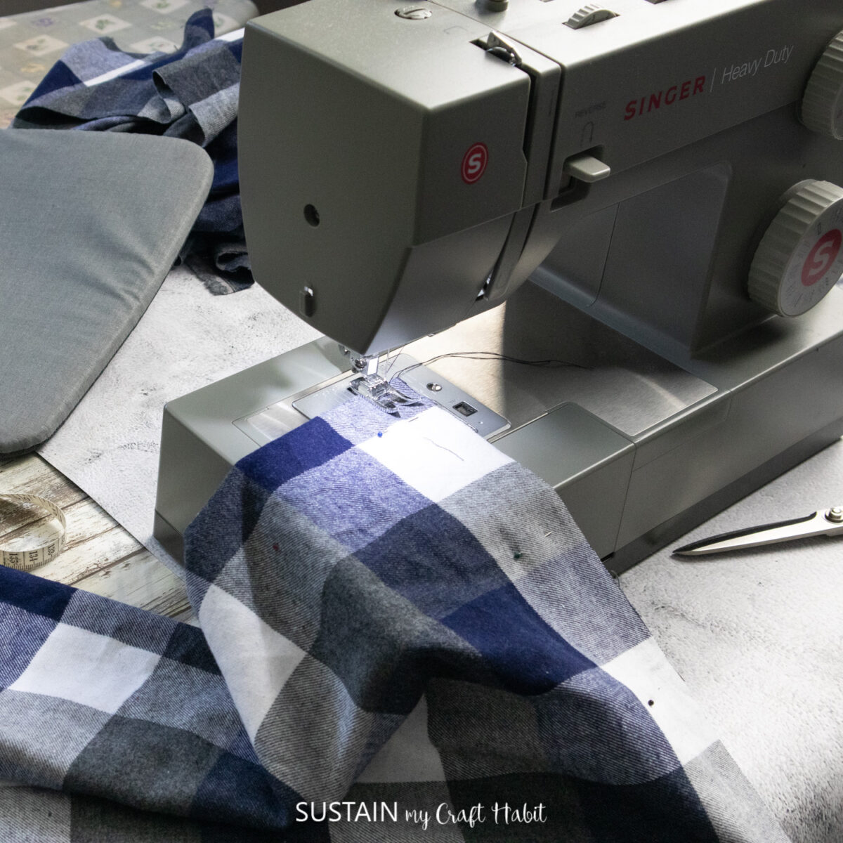 Sewing machine stitching fabric.