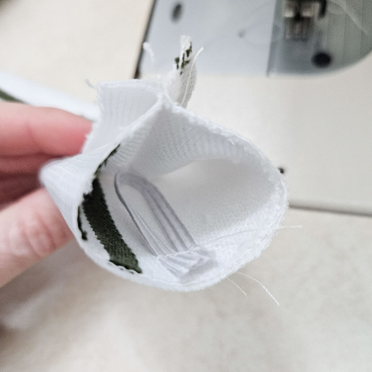 Showing elastic sewn into the tea towel.