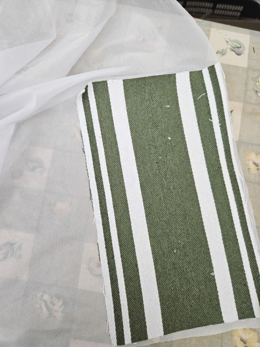 Adding fusing to the back of the tea towel.