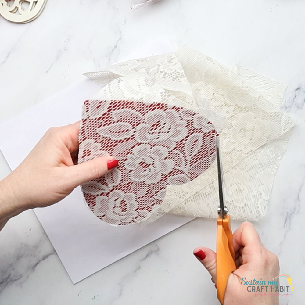 Cutting excess fabric.