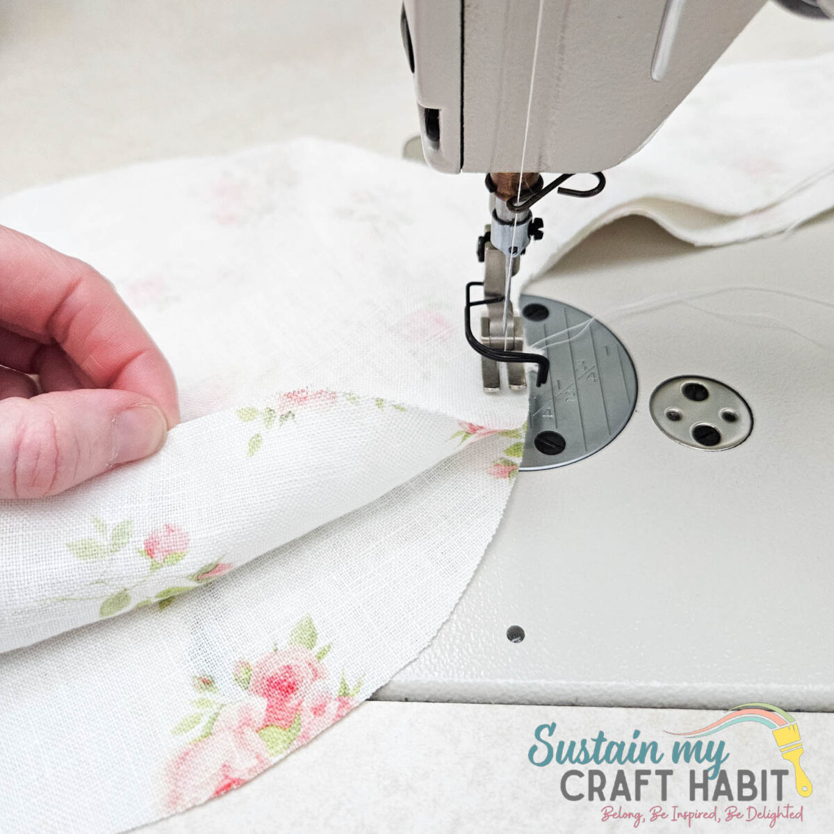 Aligning bag pieces with sewing machine.