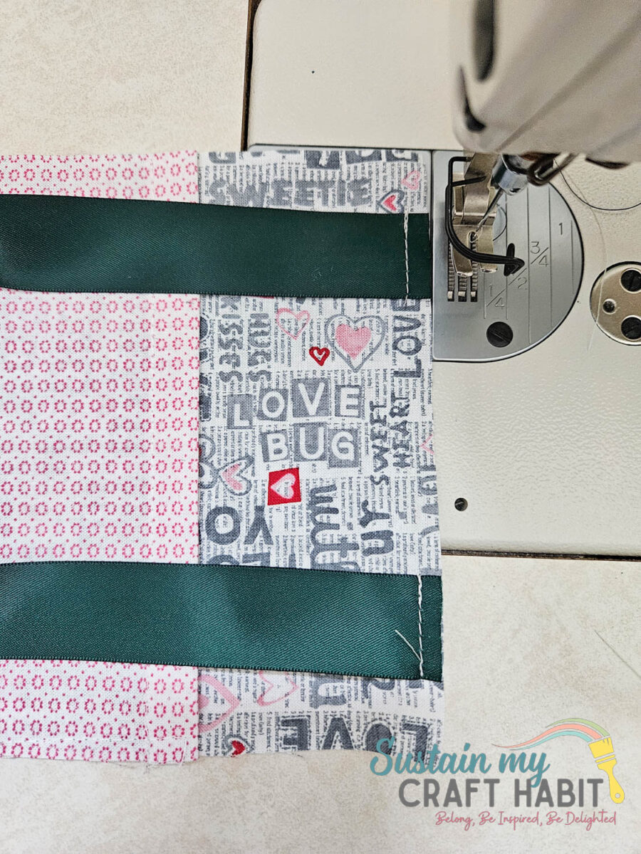 Attaching ribbon to fabric pieces. 