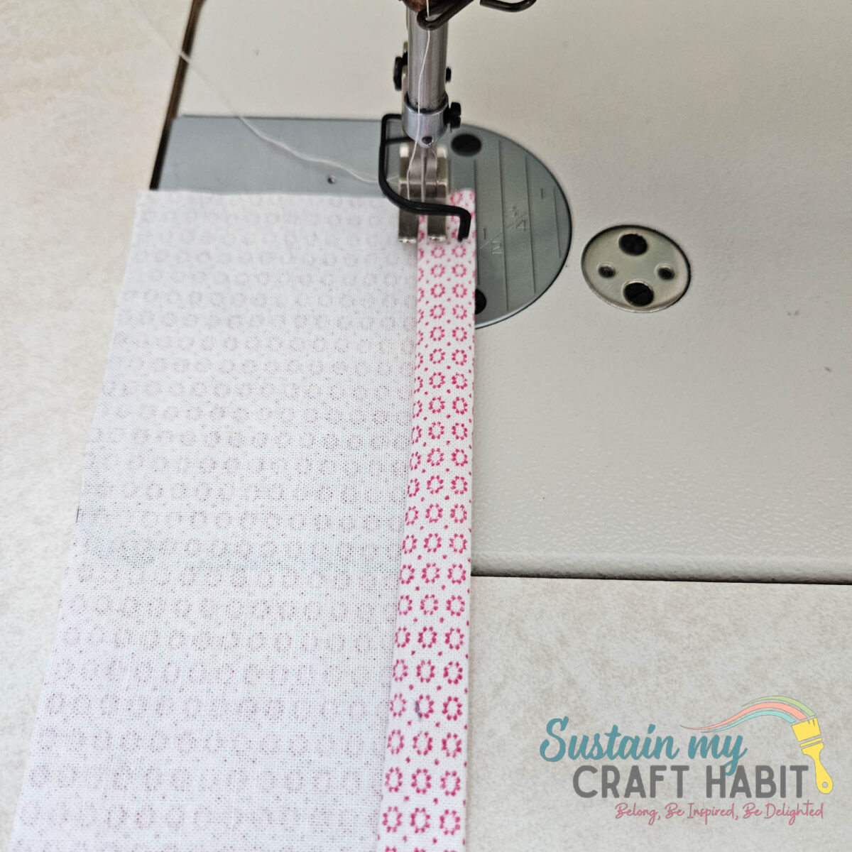 Sewing folded edge of fabric. 