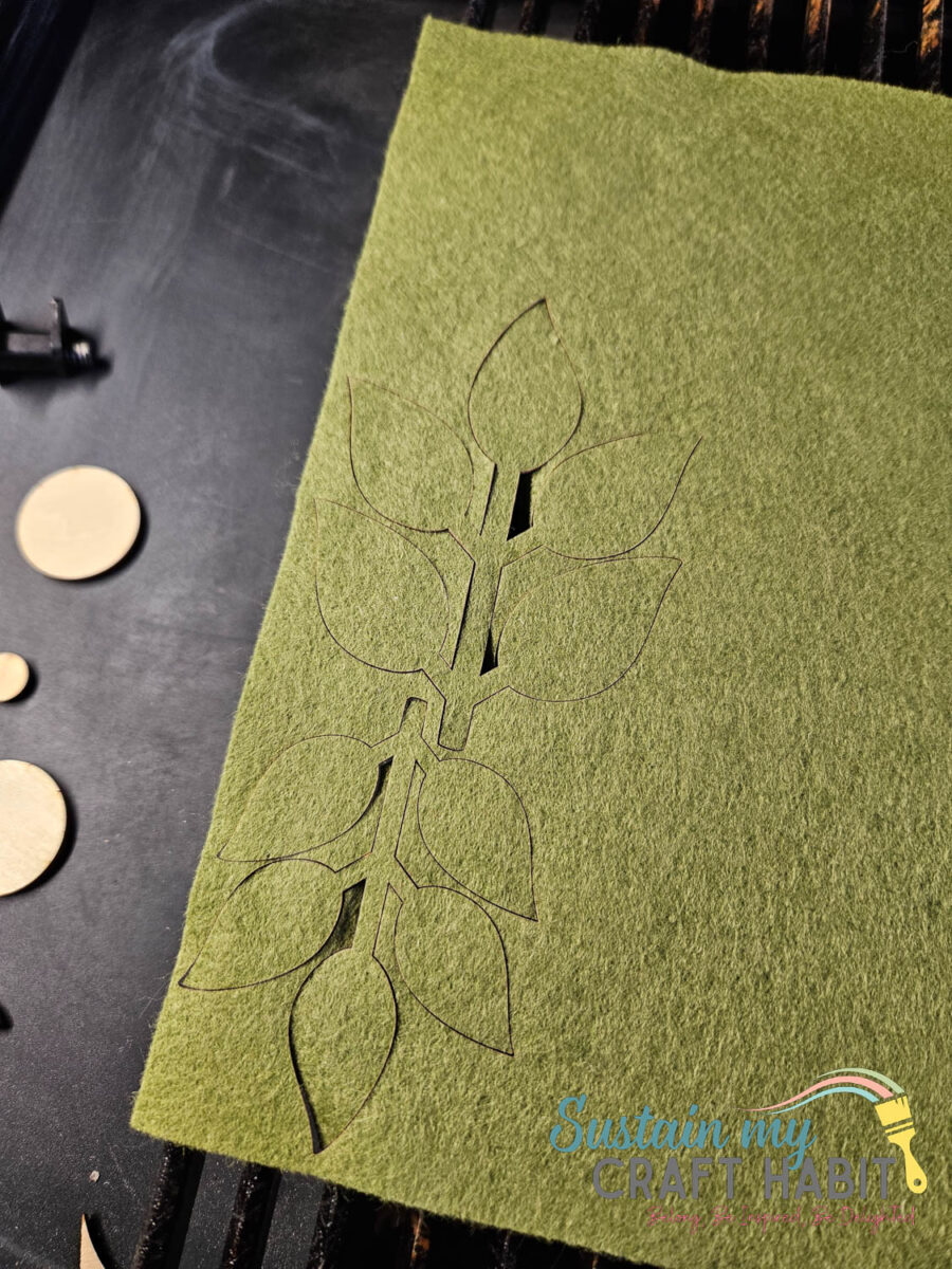 Felt sheet laser cut into leaves.