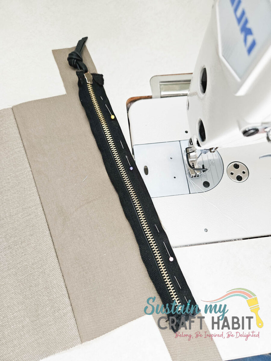 Sewing the entire bag onto a travel bag.