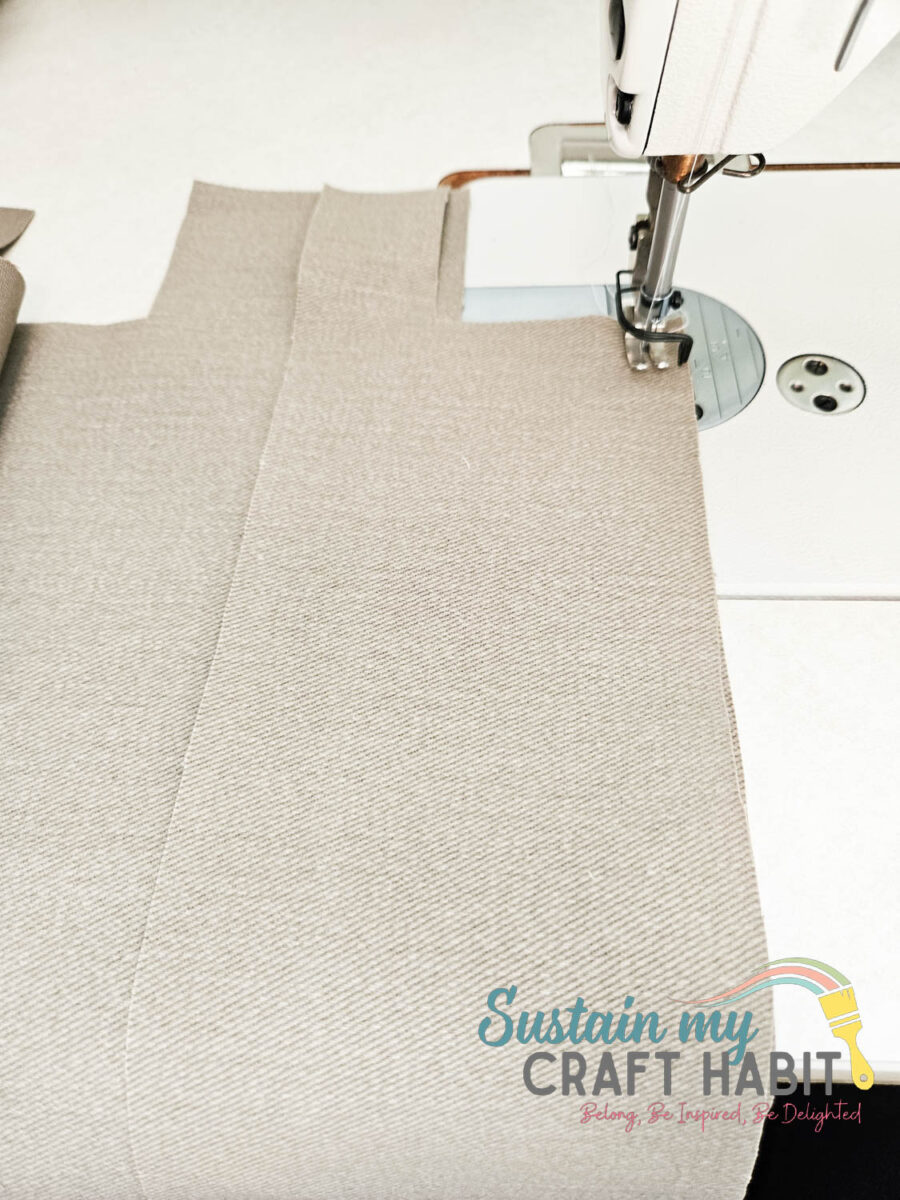 Sewing fabric pieces together.