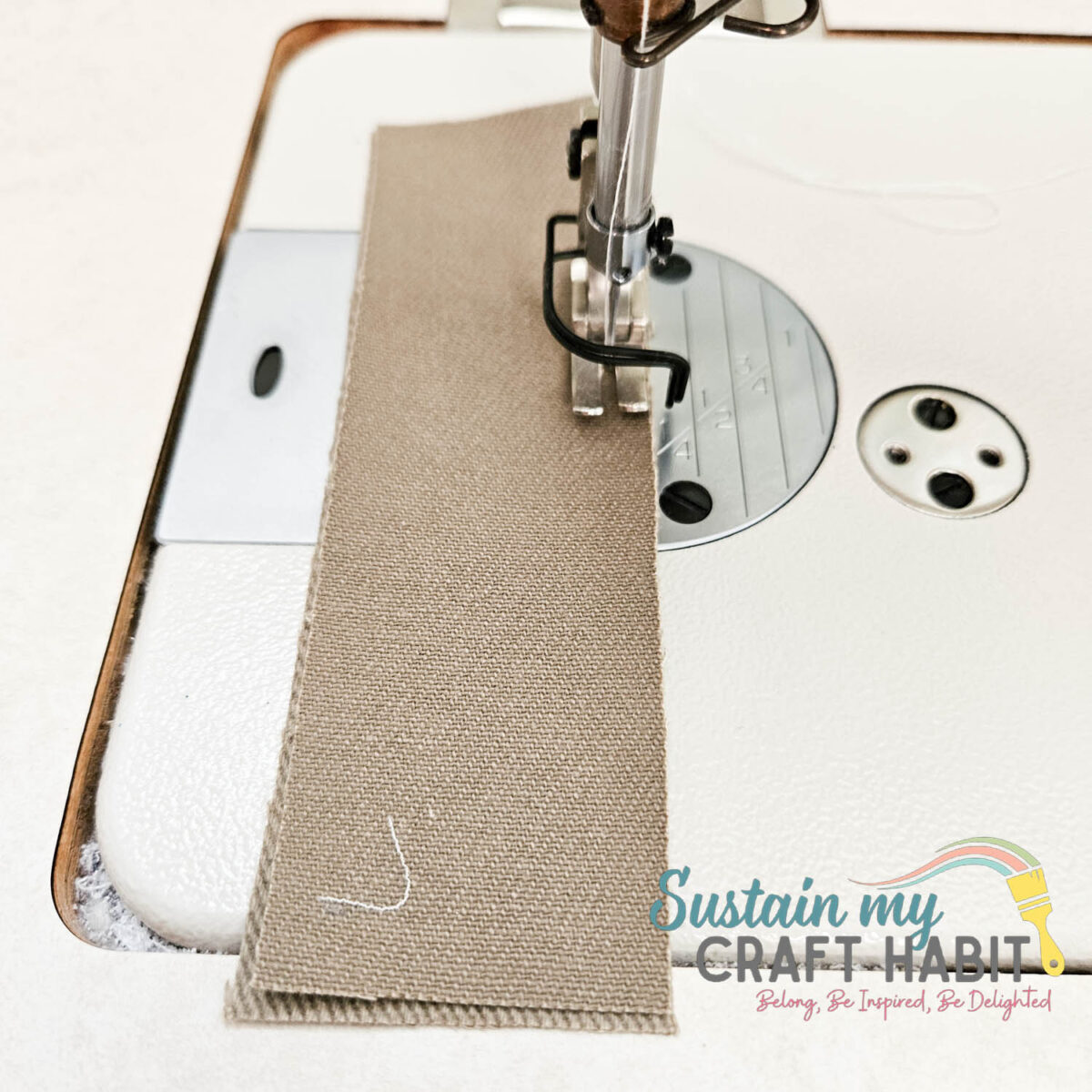 Stitching long pieces of fabric together.