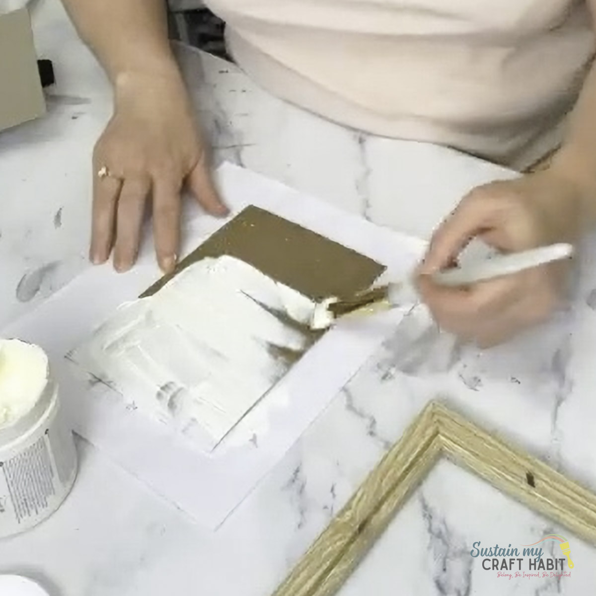 Adding paint over the glue.