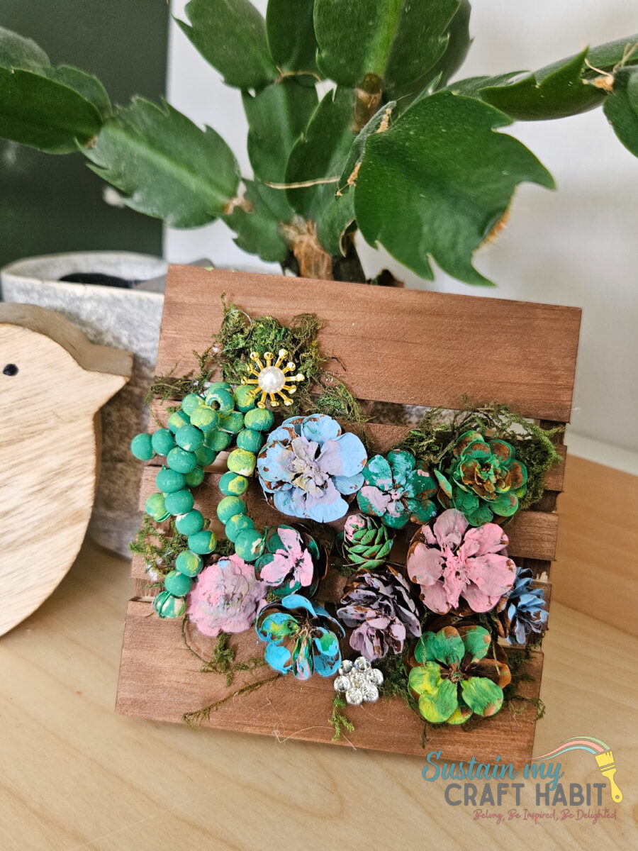 Dollar Store Mini Pallet Craft: DIY Pinecone Succulent Decor