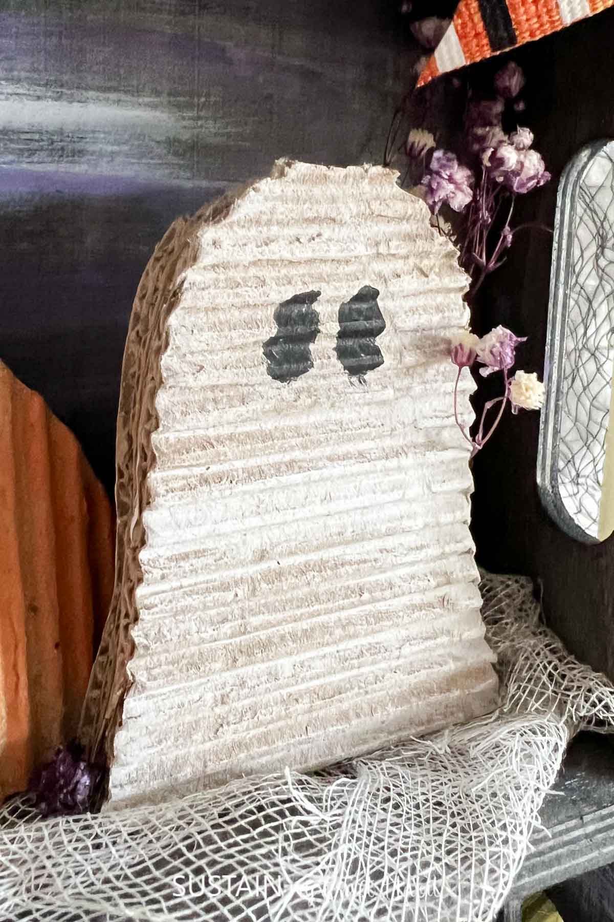 Close up of cardboard cut out ghost.