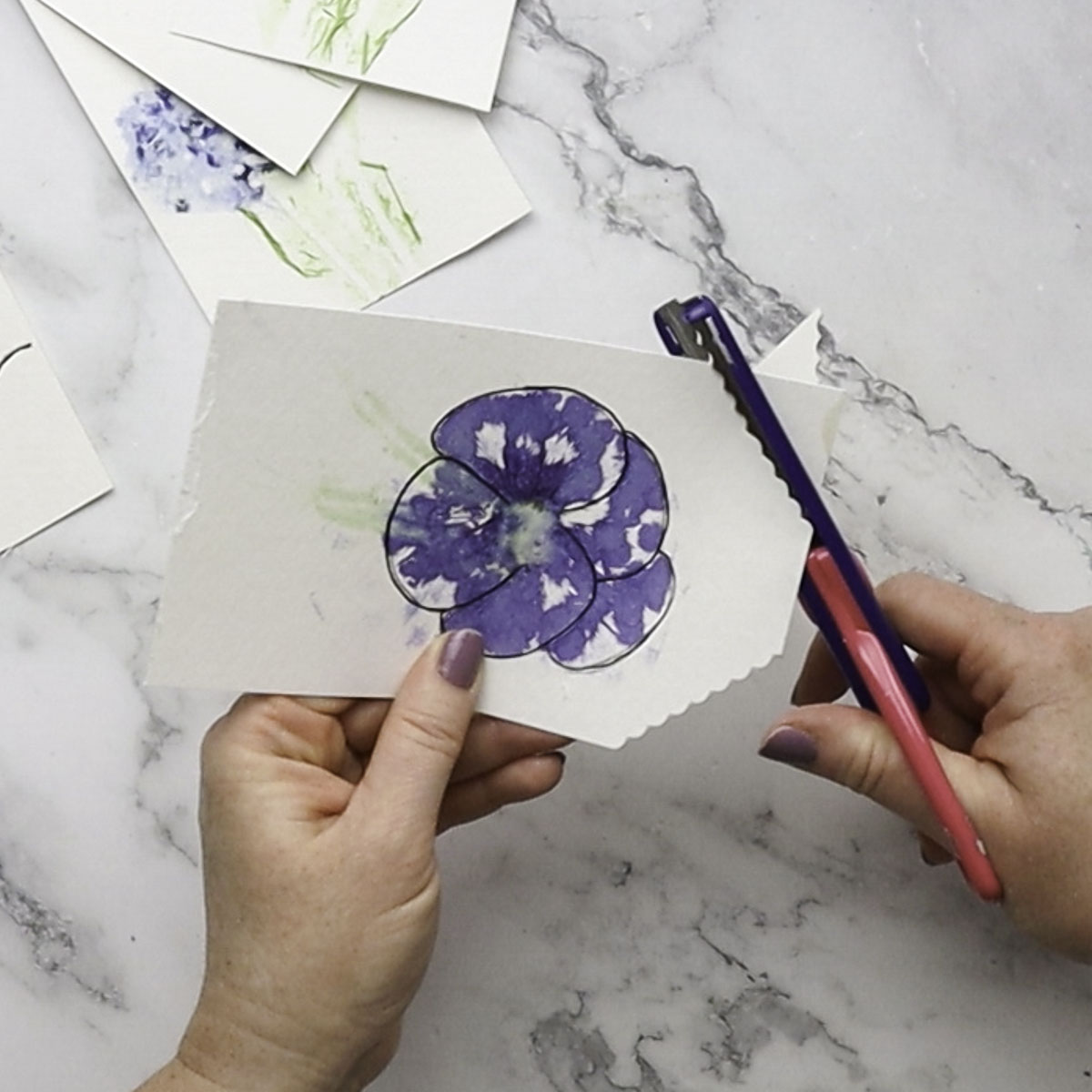 Cutting edges of paper.